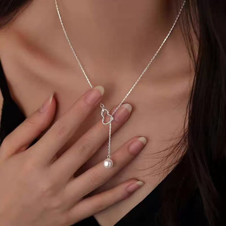 Pearl necklace with silver clasp, pearls 4–12 mm