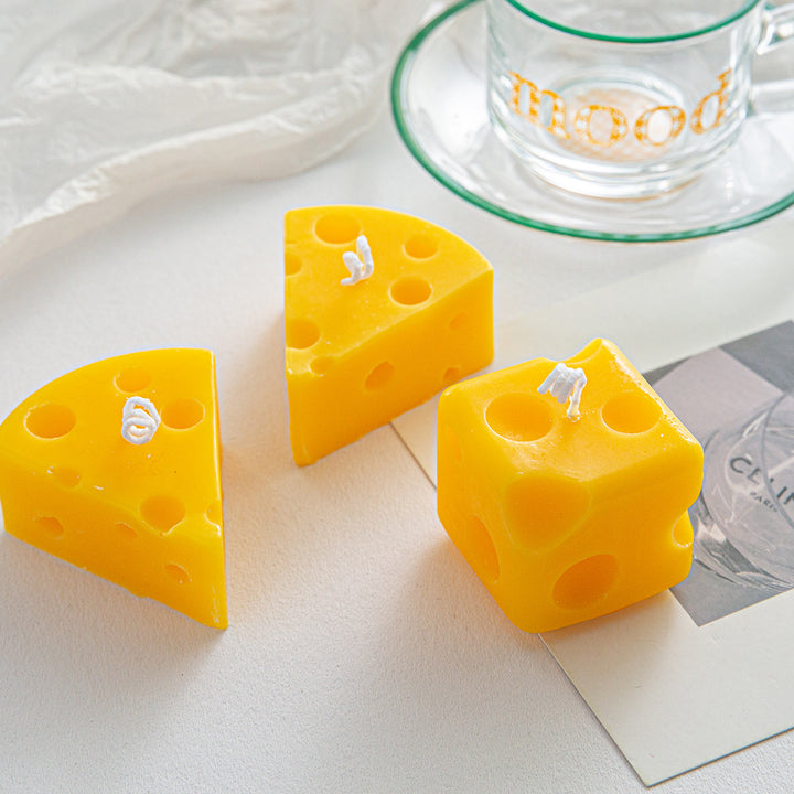Scented candle in cheese shape made of soy wax