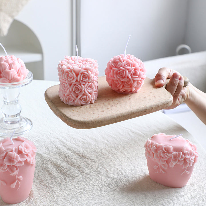 Rose-colored scented candle made from soy wax, handcrafted
