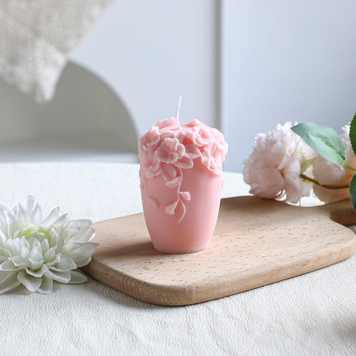 Rose-colored scented candle made from soy wax, handcrafted