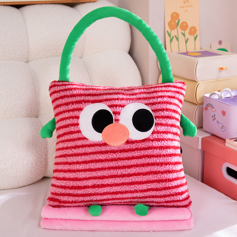 Cuddle cushion and blanket 2-in-1, striped pattern