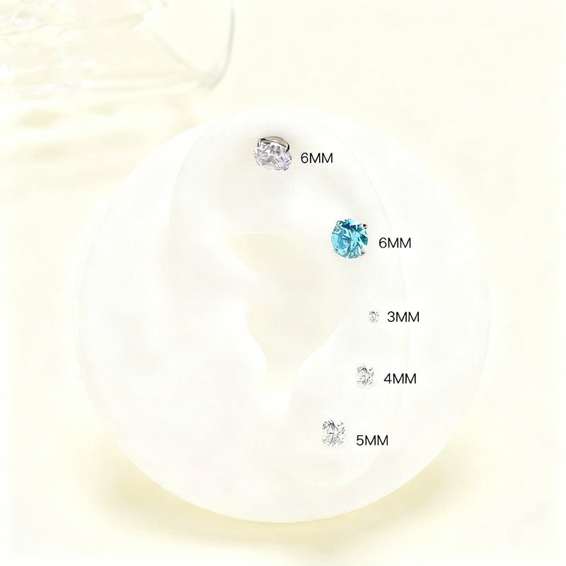 Titanium alloy earrings with zirconia, screw closure