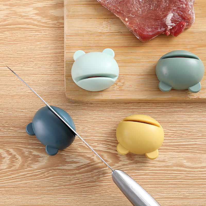 Knife sharpener with removable sharpening stone