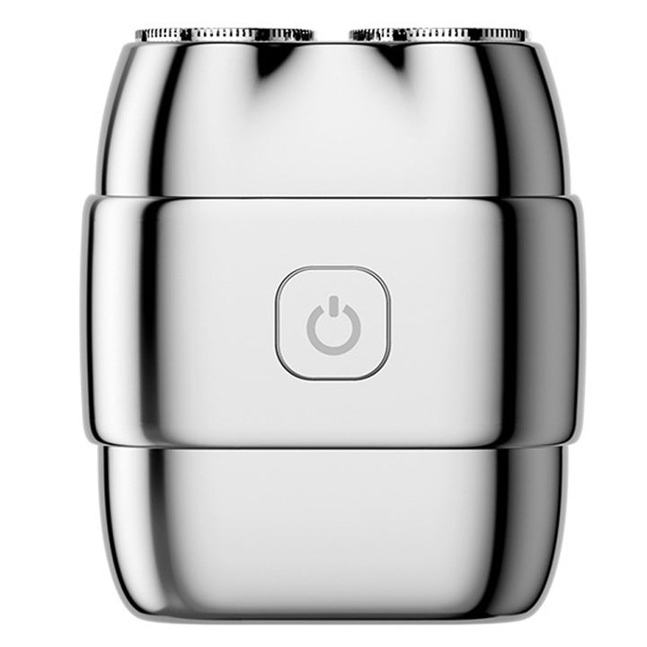 Portable electric razor with double blade ring