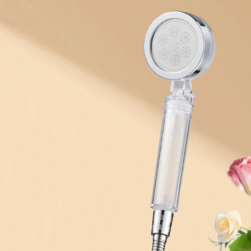 Hand shower with filter and pressure boost