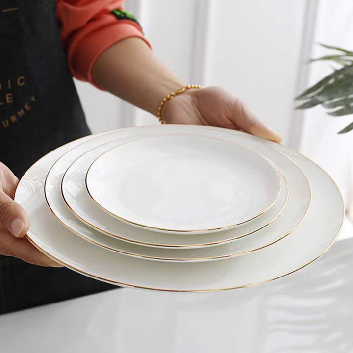 Porcelain dinnerware with gold rim, 25-piece