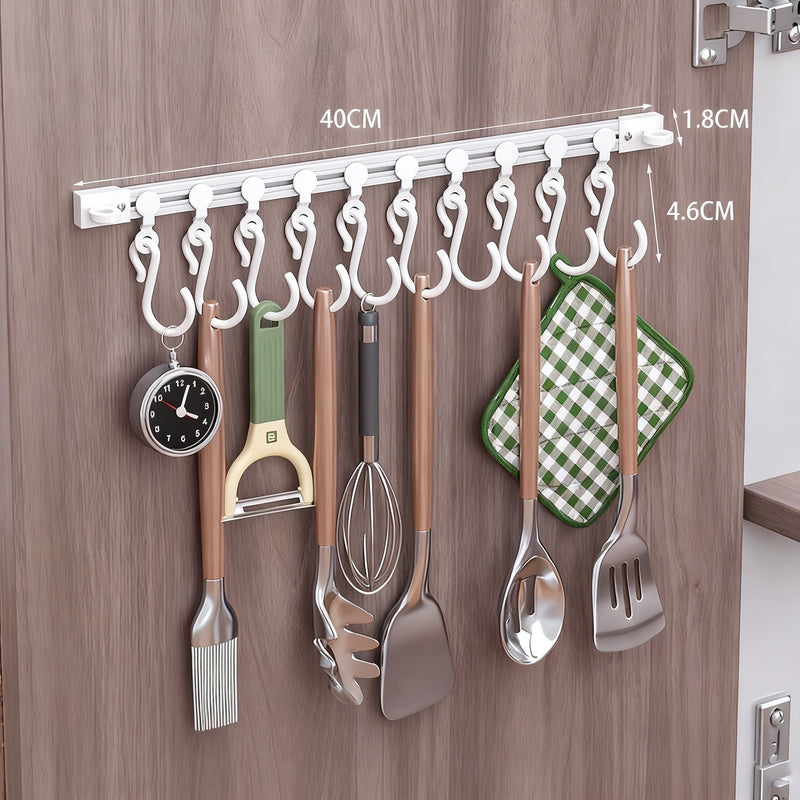 Track system with hooks for cabinet doors