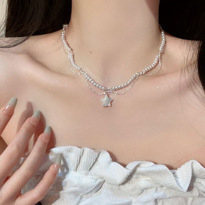 Pearl necklace with silver clasp, pearls 4–12 mm