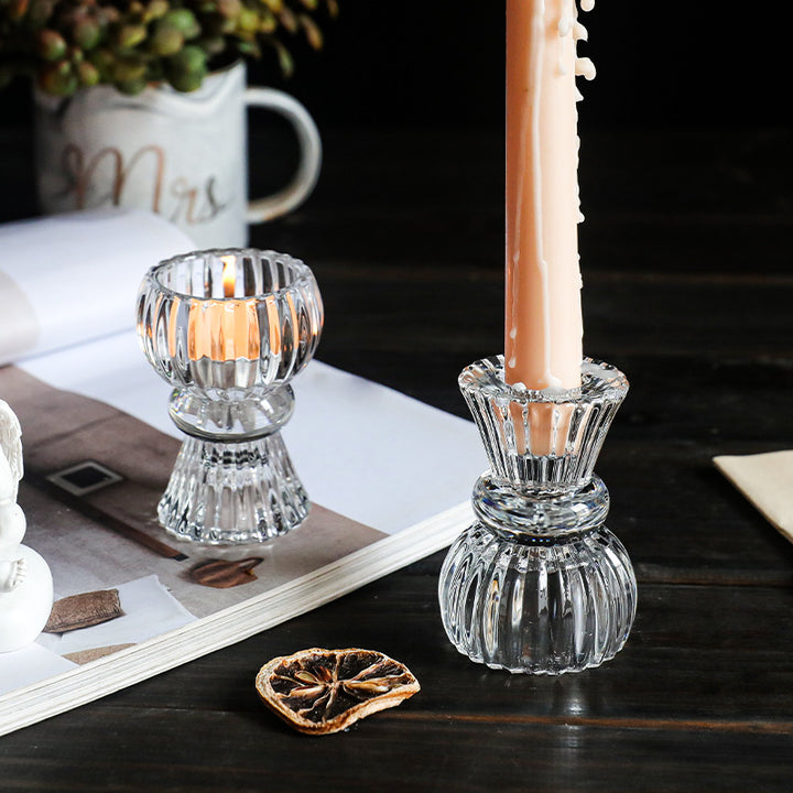 Transparent glass candle holder with Rococo design