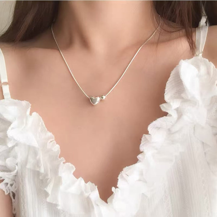 Pearl necklace with silver clasp, pearls 4–12 mm