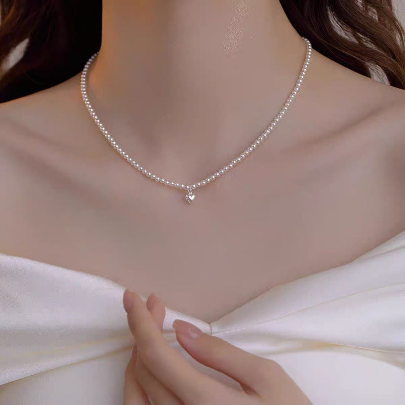 Pearl necklace with silver clasp, pearls 4–12 mm