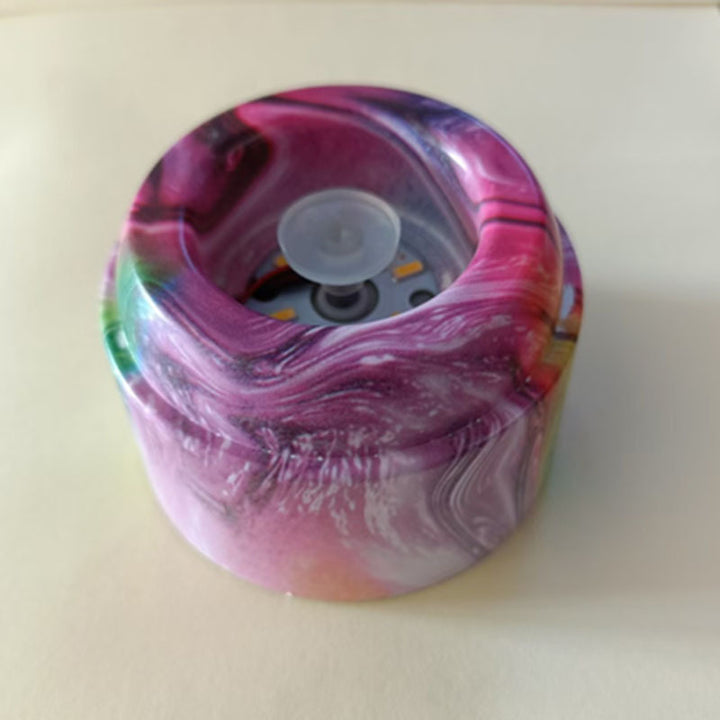 Glowing crystal ball with rotating base