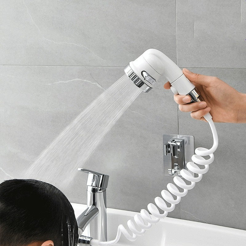 Faucet attachment with shower head and filtration