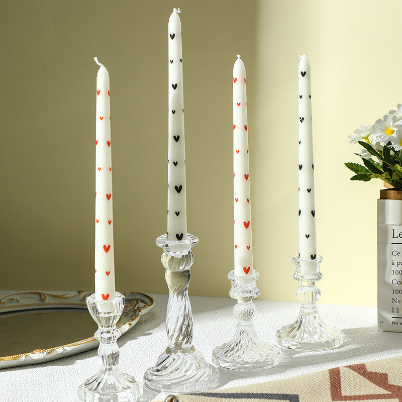 Transparent glass candle holder with structured pattern