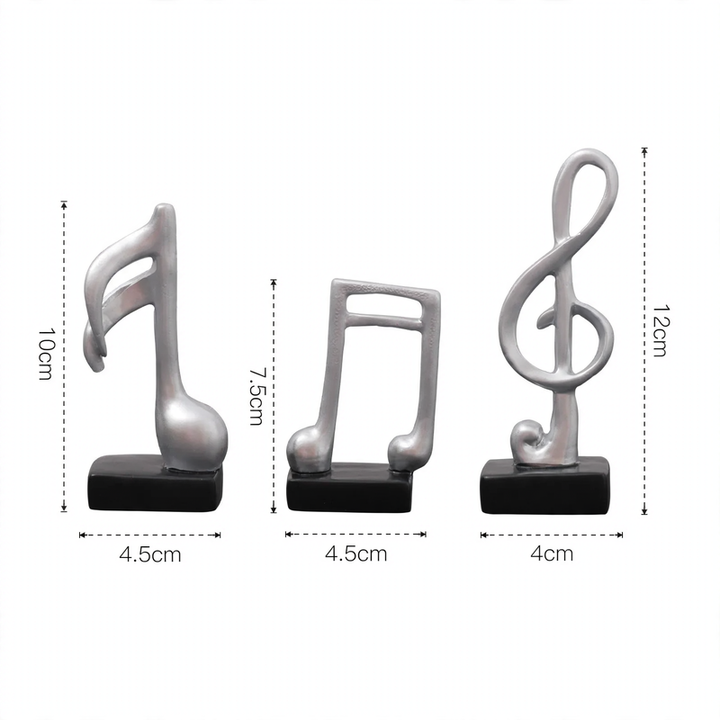 Three music note figures, resin, modern