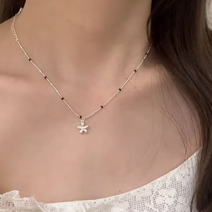 Pearl necklace with silver clasp, pearls 4–12 mm