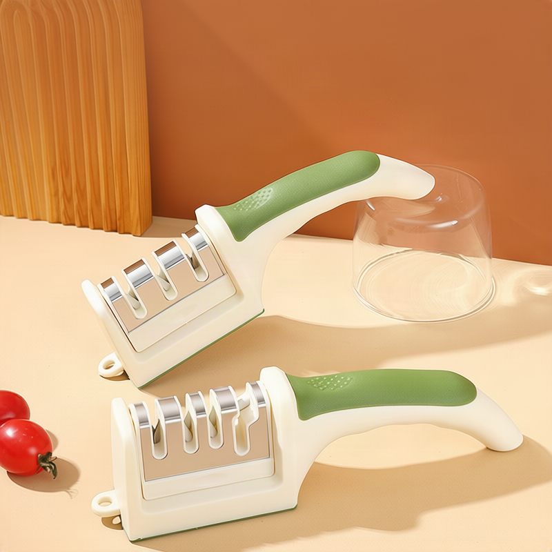 Knife sharpener with removable sharpening stone