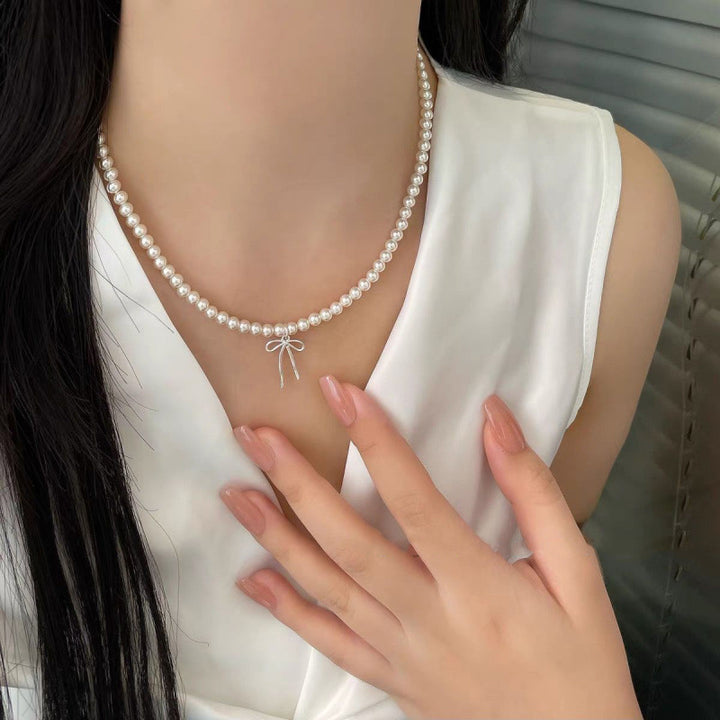 Pearl necklace with silver clasp, pearls 4–12 mm