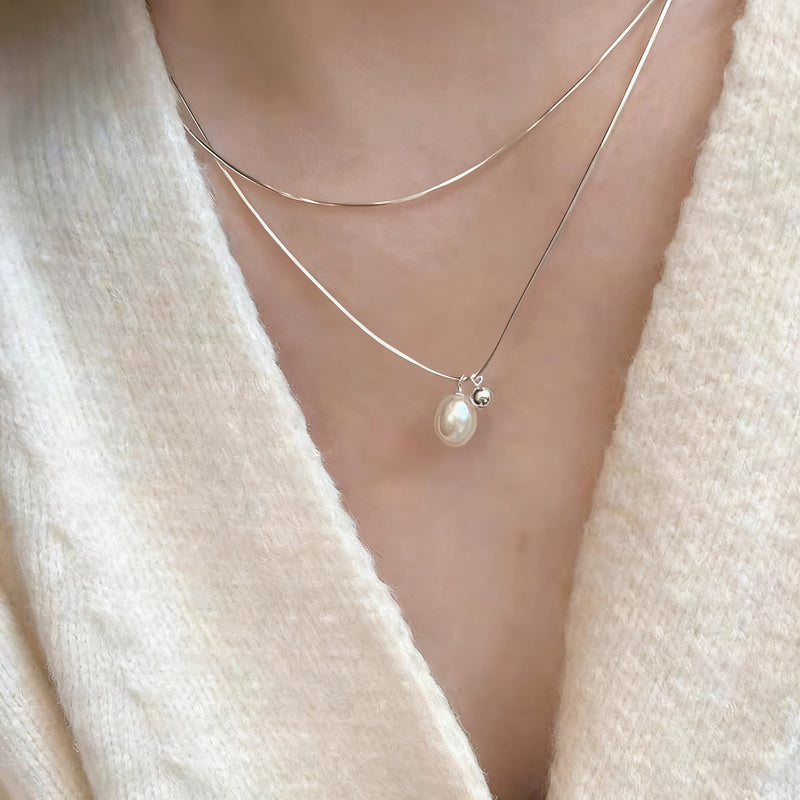 Pearl necklace with silver clasp, pearls 4–12 mm