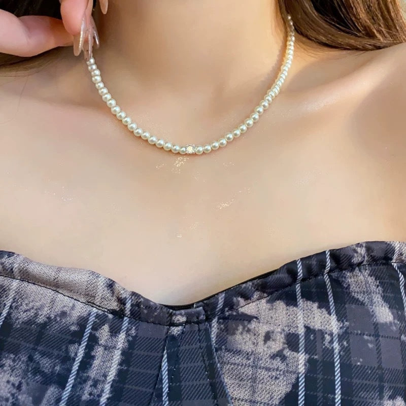 Pearl necklace with silver clasp, pearls 4–12 mm