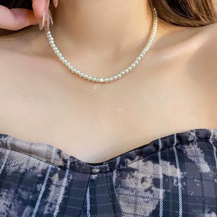 Pearl necklace with silver clasp, pearls 4–12 mm