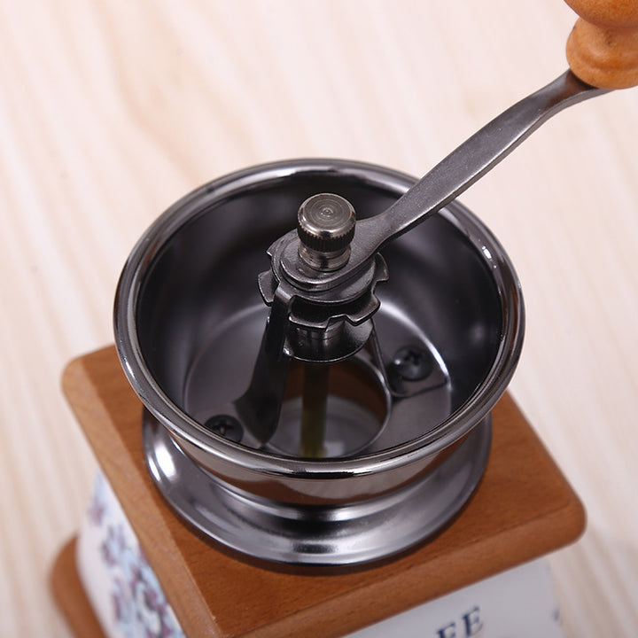 Hand coffee grinder with CNC grinding mechanism and brush