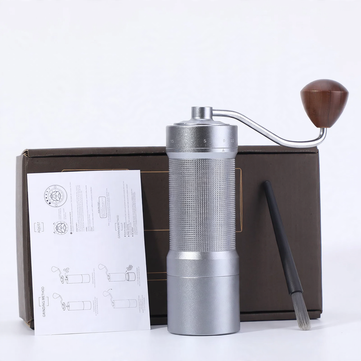 Hand coffee grinder with CNC grinding mechanism and brush