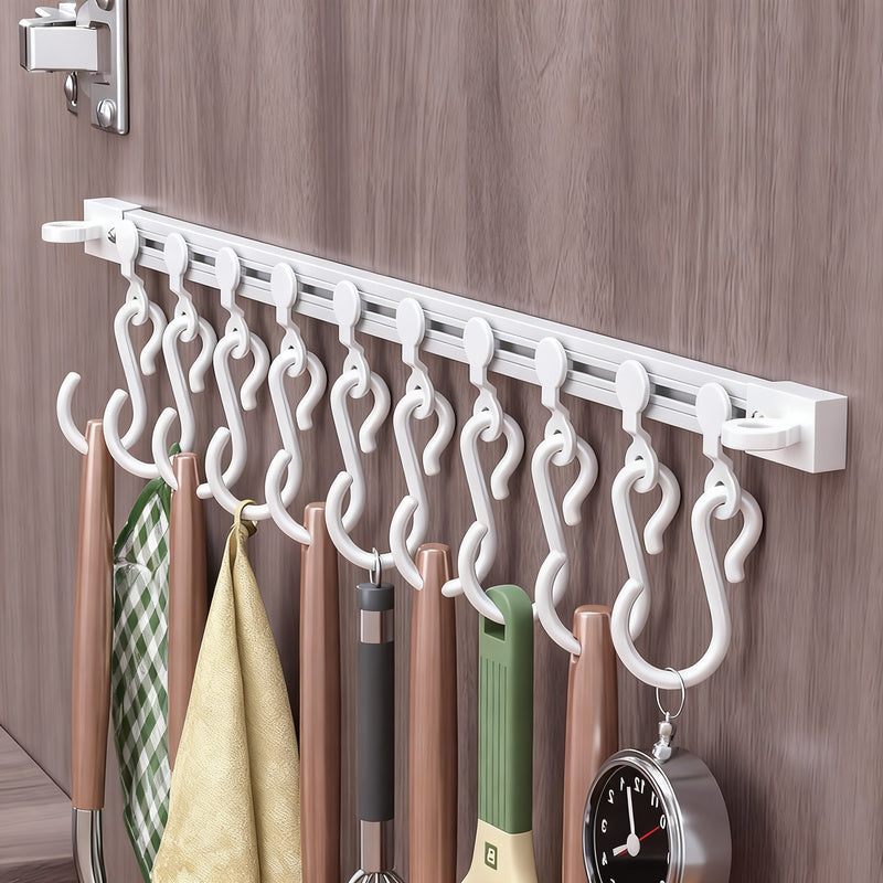 Track system with hooks for cabinet doors