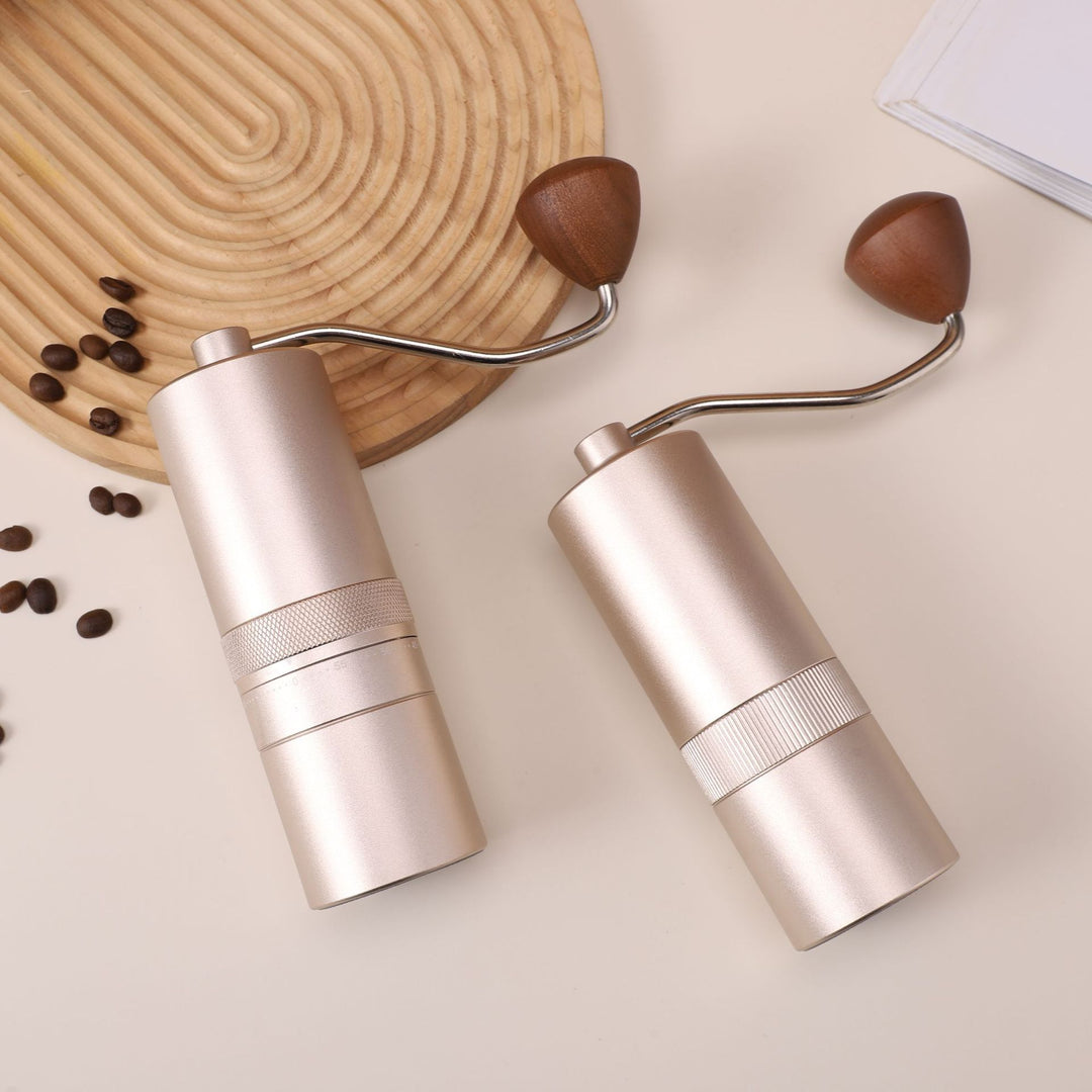 Hand coffee grinder with CNC grinding mechanism and brush