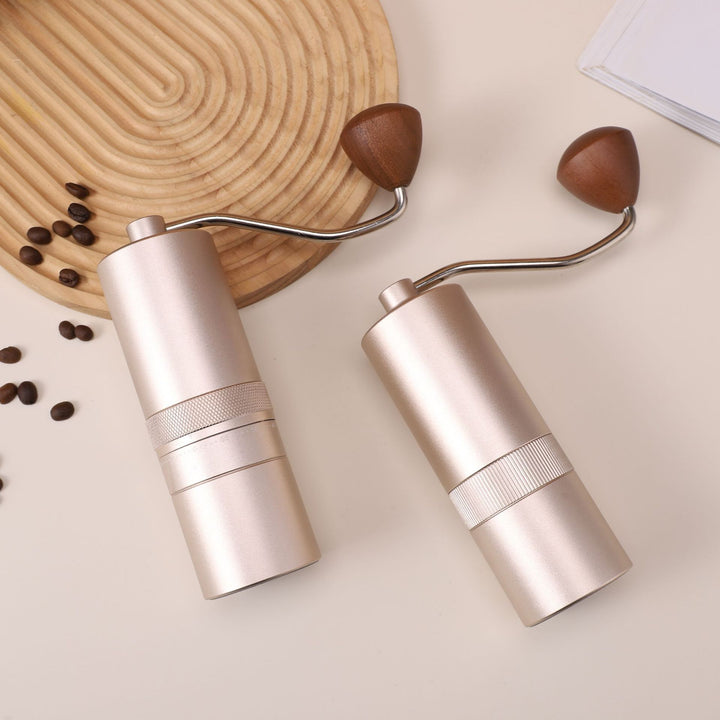 Hand coffee grinder with CNC grinding mechanism and brush