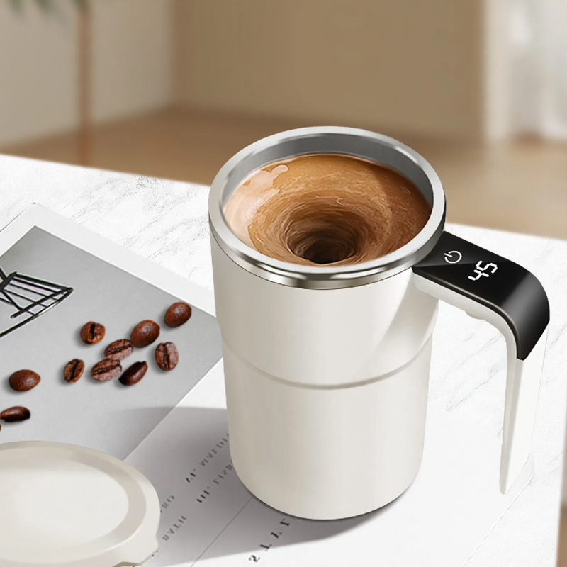 Self-stirring stainless steel coffee mug with temperature display