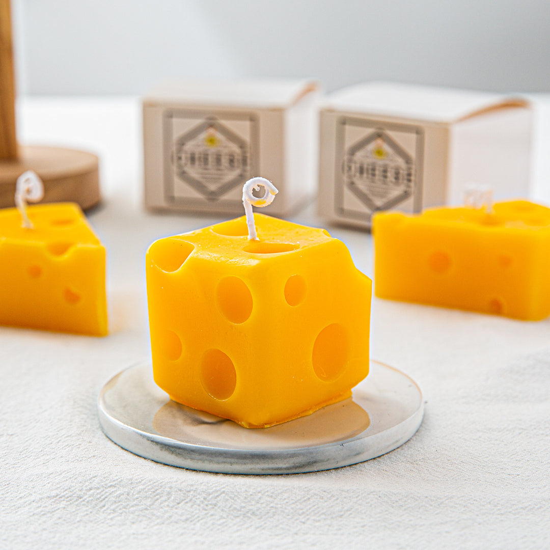 Scented candle in cheese shape made of soy wax