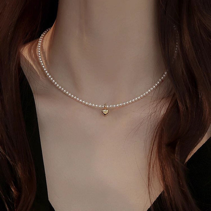 Pearl necklace with silver clasp, pearls 4–12 mm