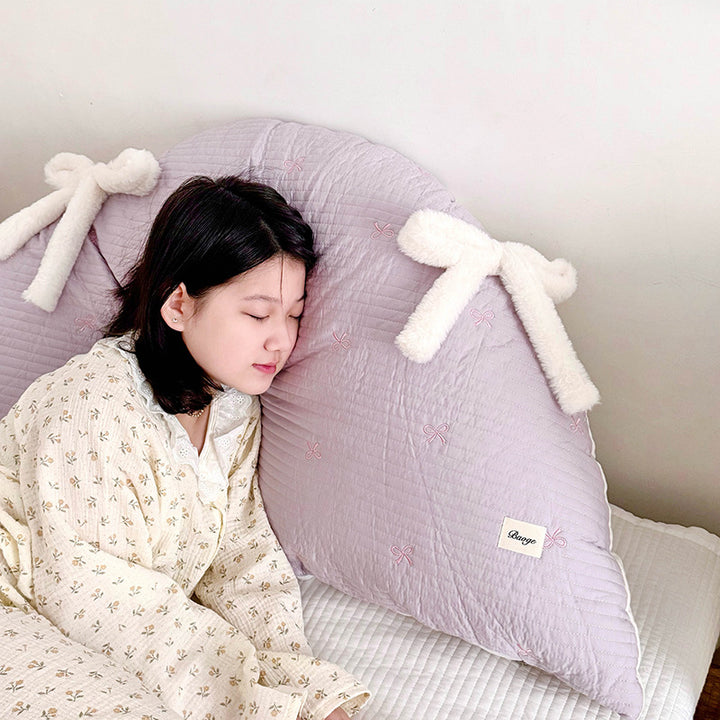Cotton pillow with bow pattern