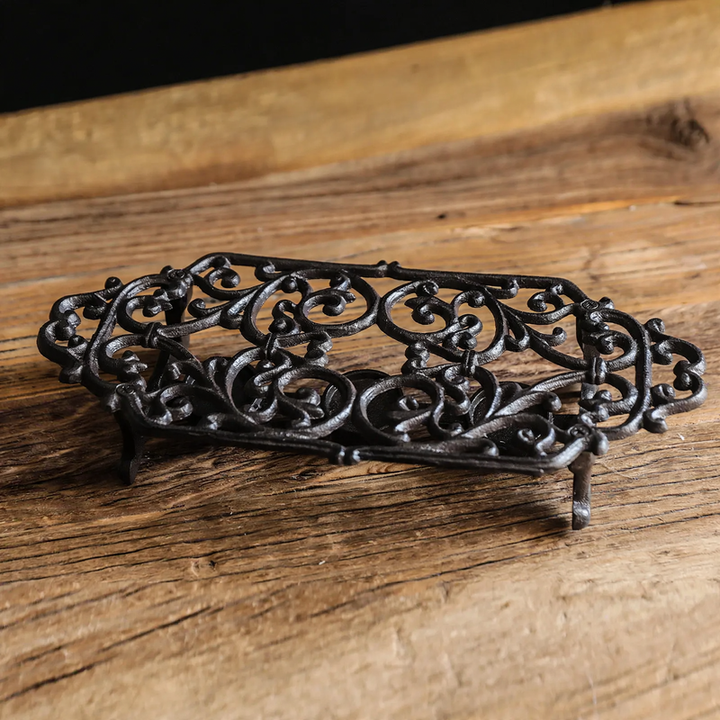 Cast iron tea warmer with burner stand
